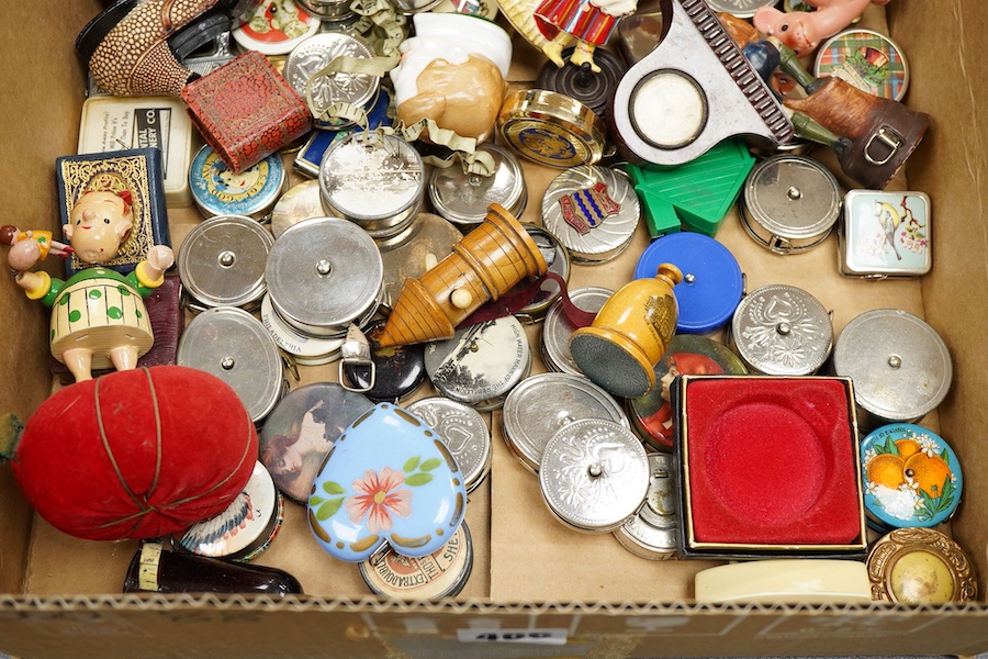 A collection of late 19th and 20th century novelty / souvenir sewing related tape measures